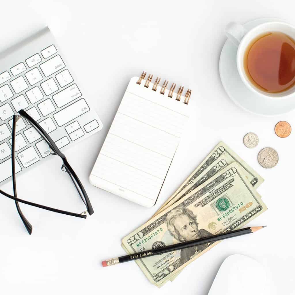 Pinterest affiliate marketing - money and notepad on desk