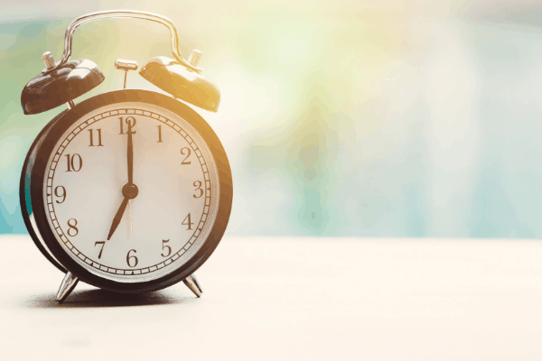 why hire a pinterest manager - a clock on a table